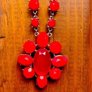 Bright red long jeweled necklace